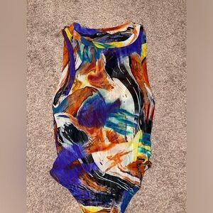 Colorful body suit from Miss Lola boutique